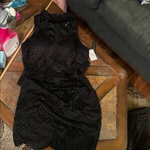 Elegant Black Lace Dress by My Michelle, size 13. Padded bra area, scalloped hem